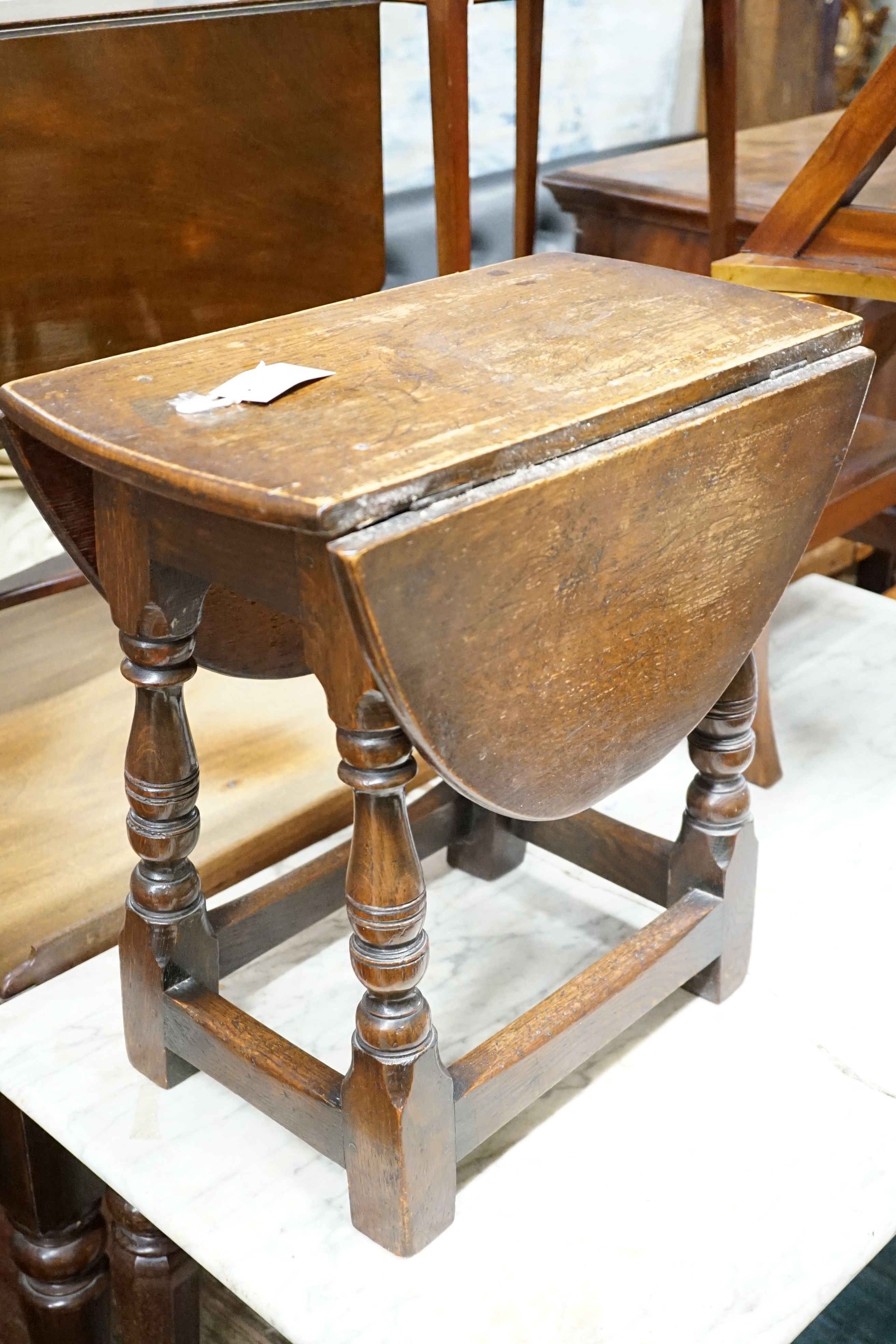 A set of library steps / chair and a small oval oak gateleg coffee table